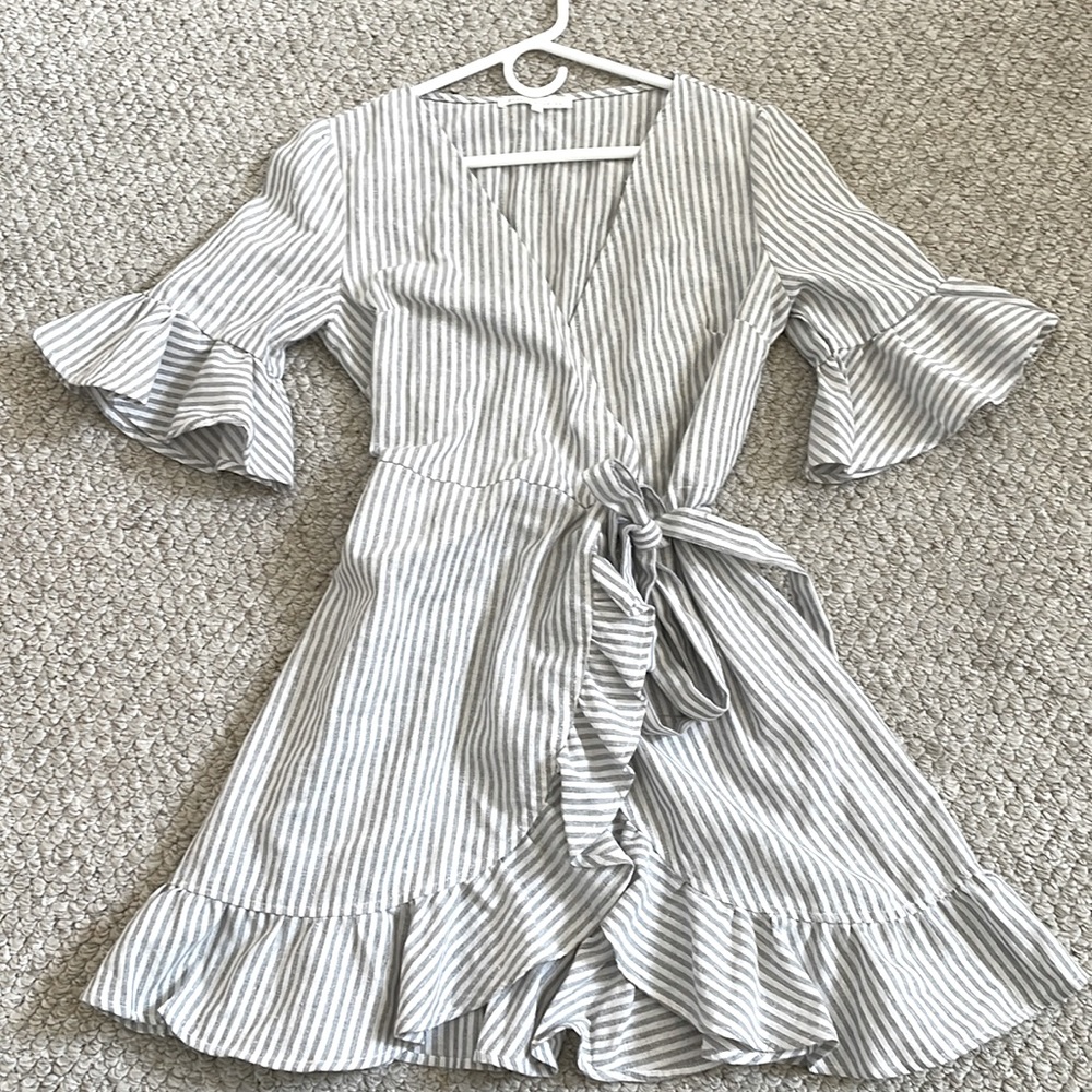 White and grey stripped dress that ties on the side.